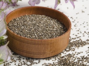Chia seed healthy super food with flower over white